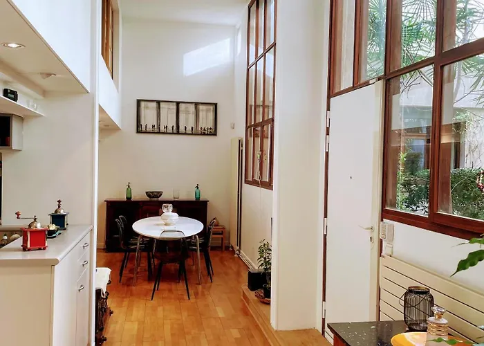 Loft With View On A Quiet Garden, Parisian Charm