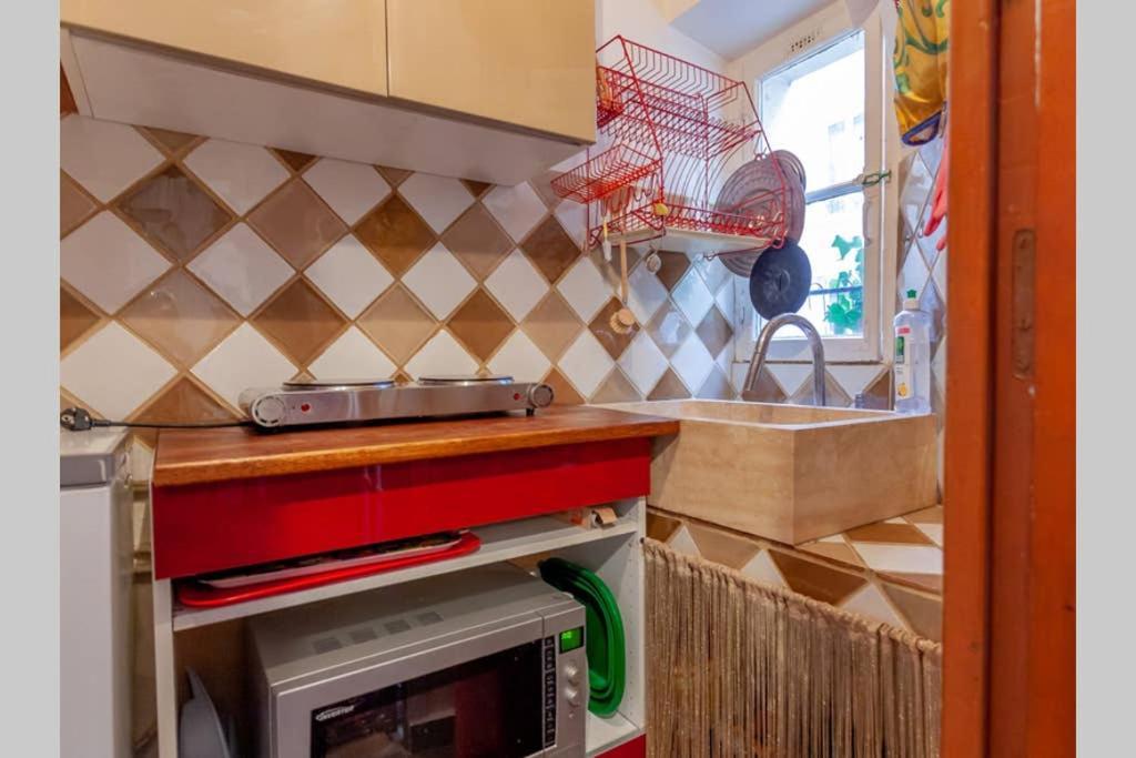 Greeter-nid Douillet Au Bord Du Canal St Martin Apartment *