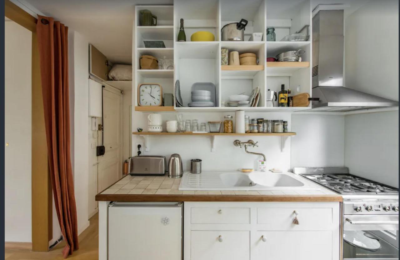 Petit Lumineux Et Atypique à 14. Appartement Paris
