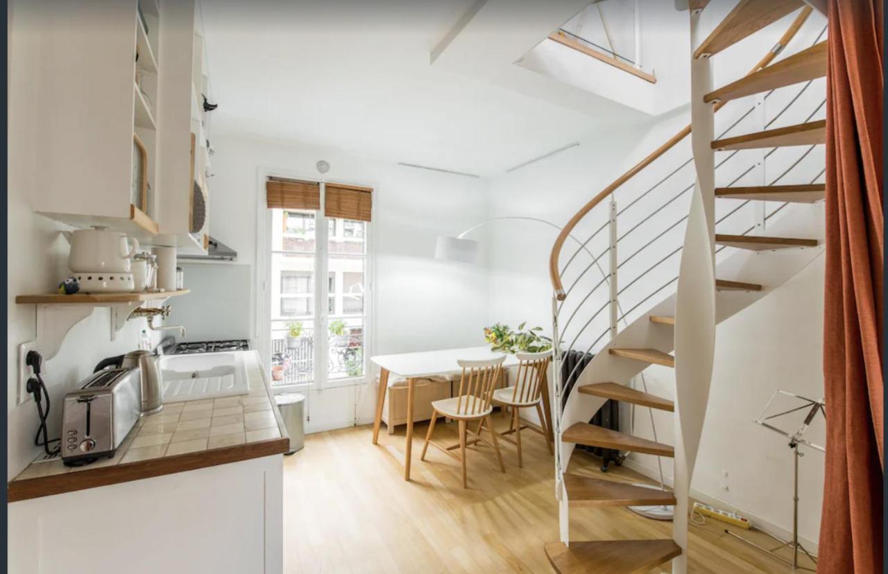 Petit Lumineux Et Atypique à 14. Appartement