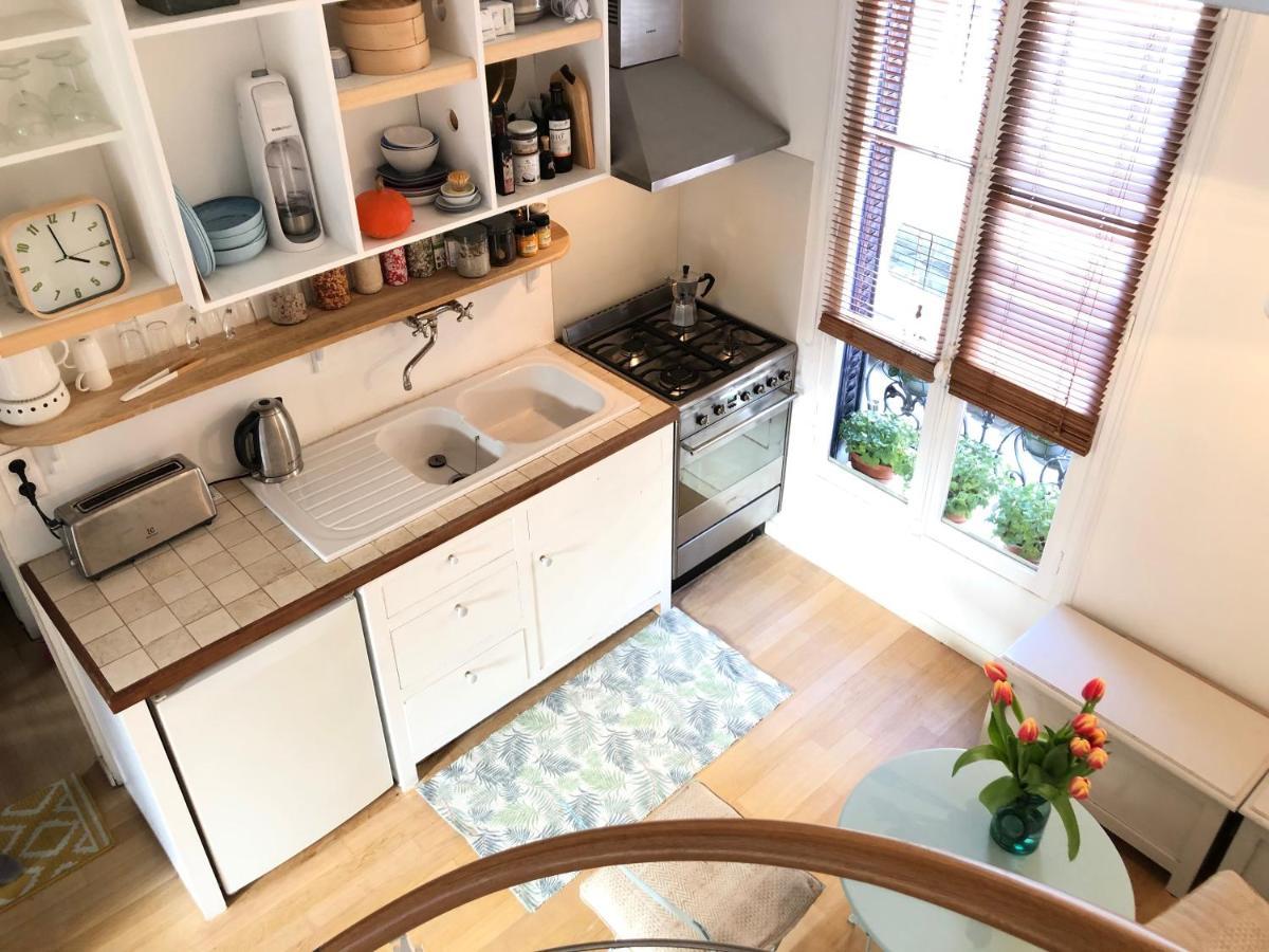 Petit Lumineux Et Atypique à 14. Appartement