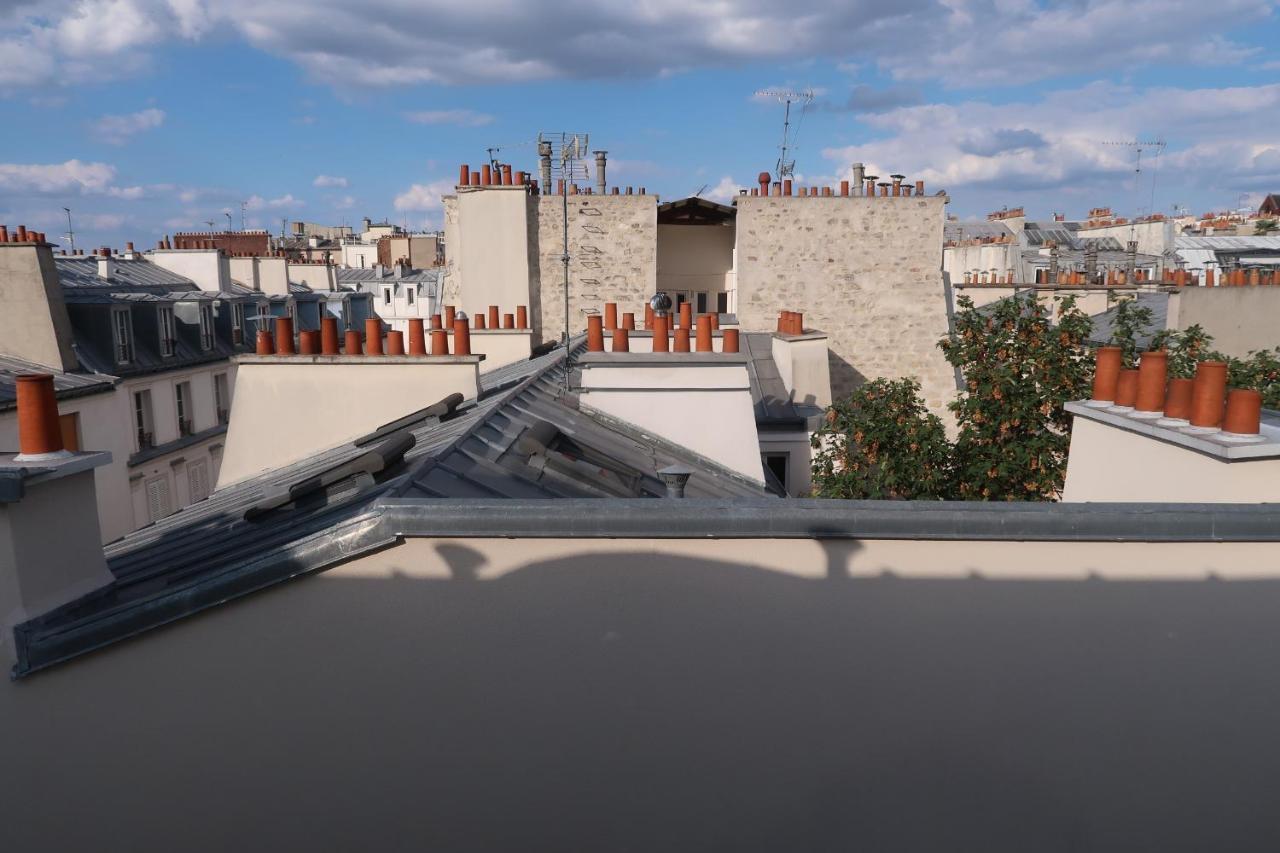 Apartment Parisian Cozy Studio: Batignolles Charm Near Landmarks Paris