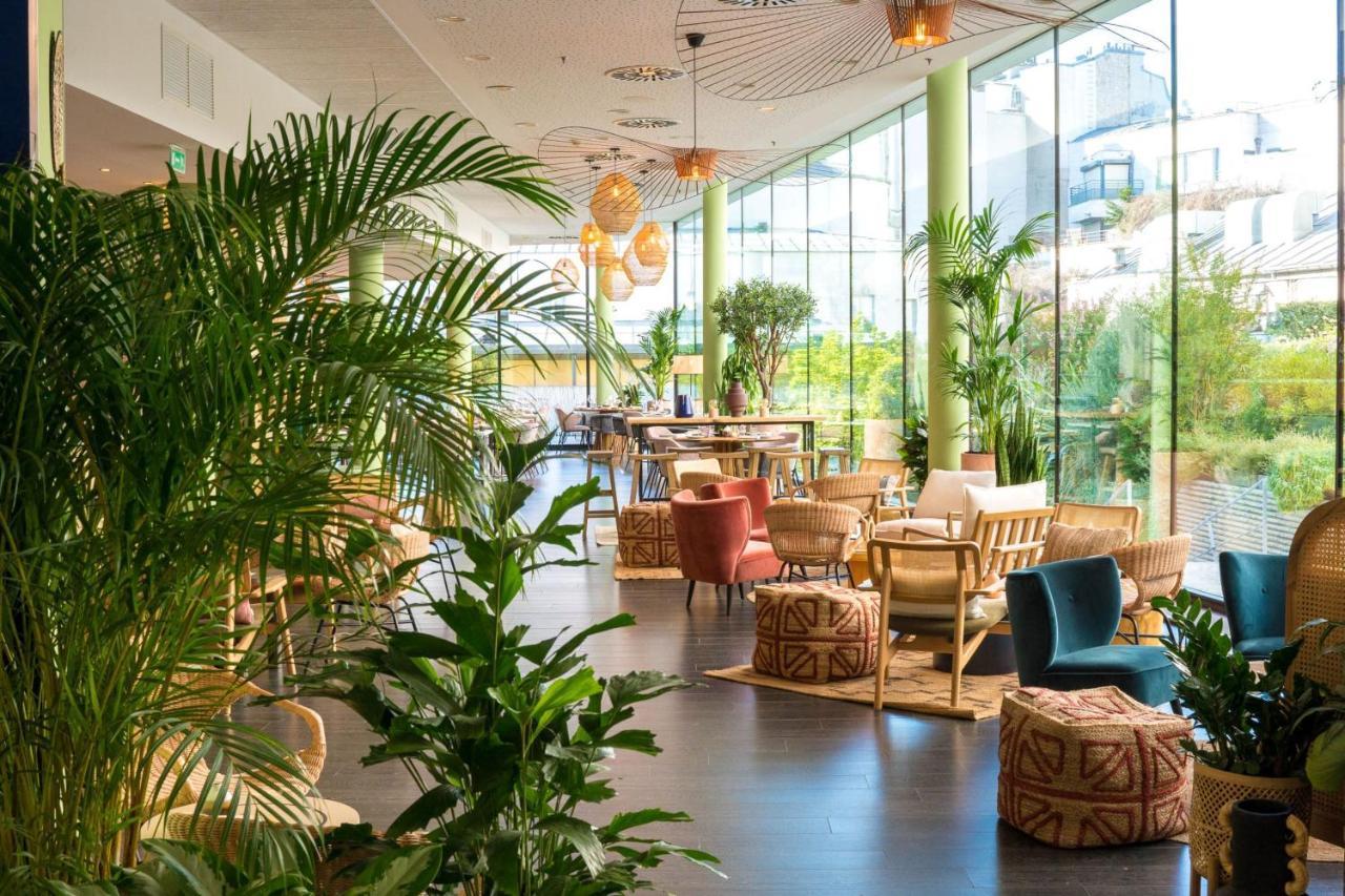 Hotel Renaissance Arc De Triomphe 5*