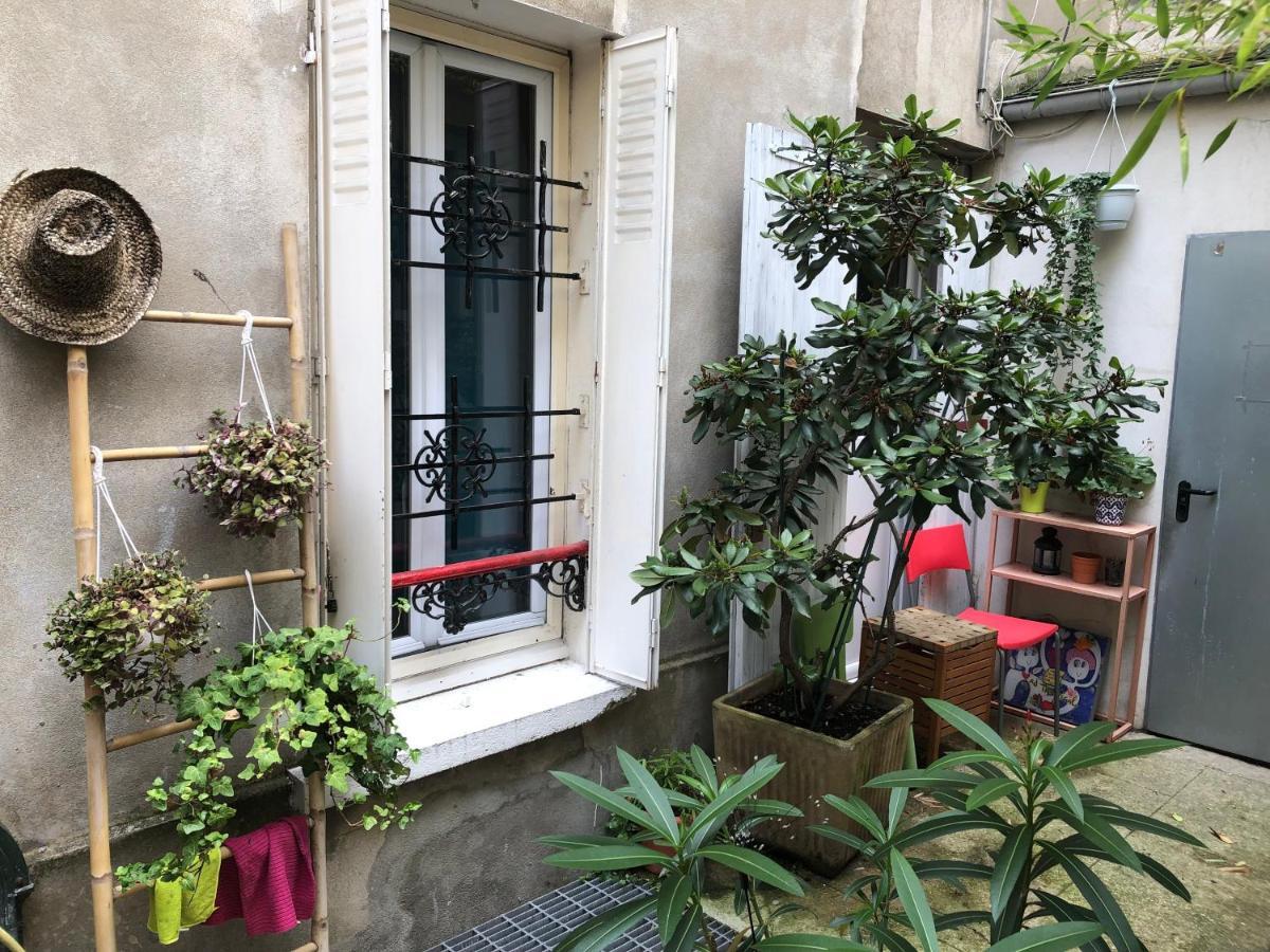 Maryline: Cozy Parisian Retreat With Patio View Paris