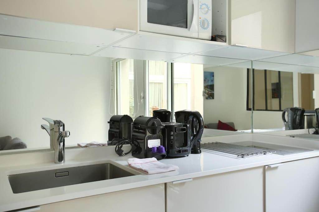 Apartment Le Marais Place Des Vosges By Prestige