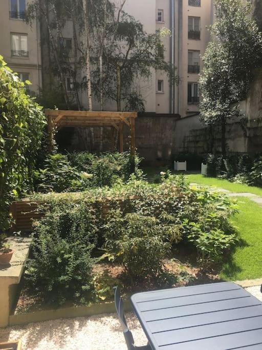4 Personnes Avec Jardin-paris Centre Apartment