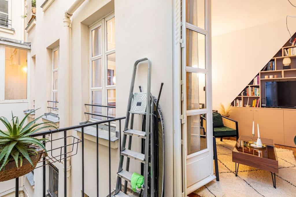 Chic Parisian Haven: Designer In The Heart Of