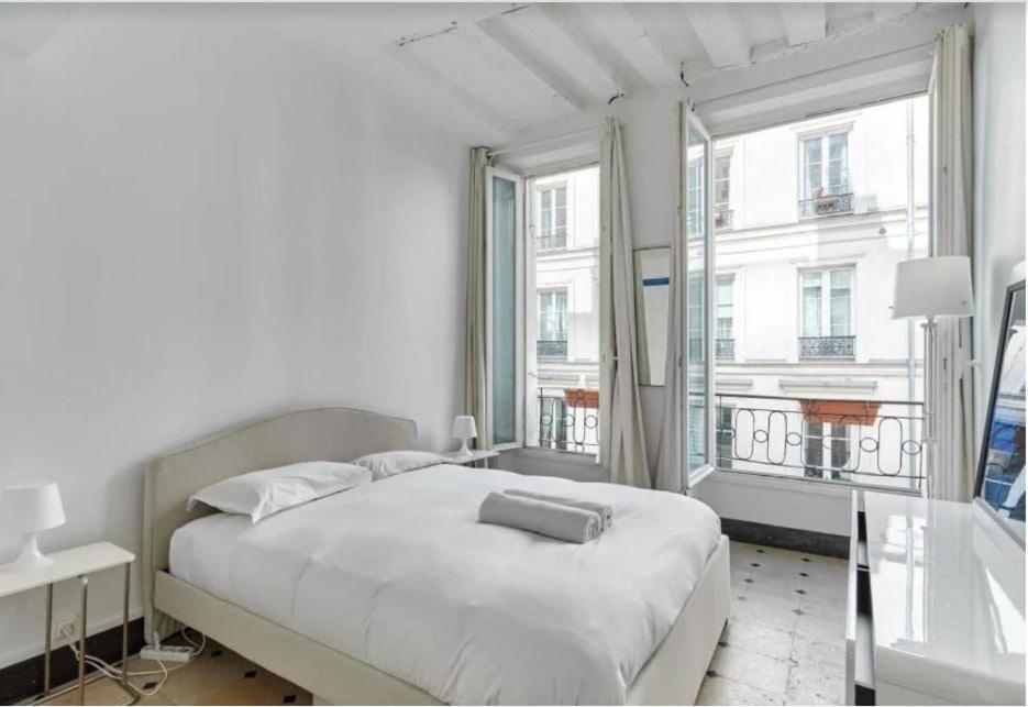 Les Secrets De La Rue Dauphine * Paris