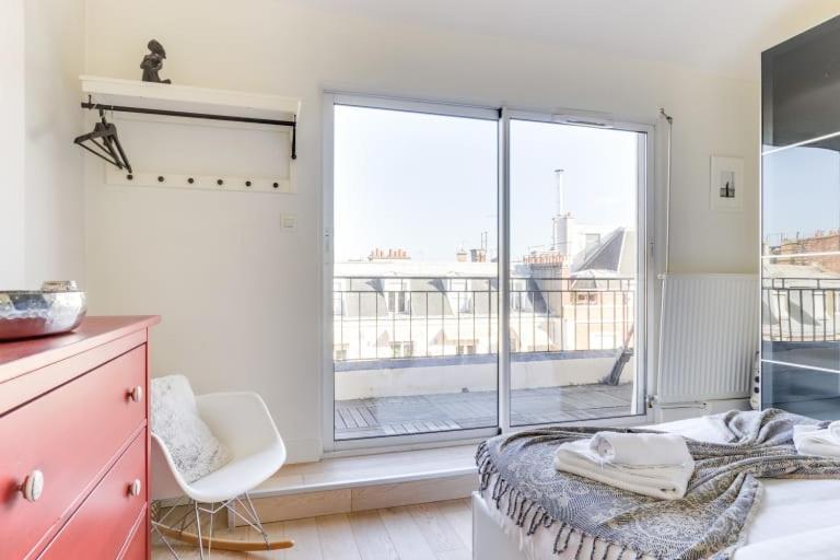 Guestready - Terrasse Vue Tour Eiffel Paris