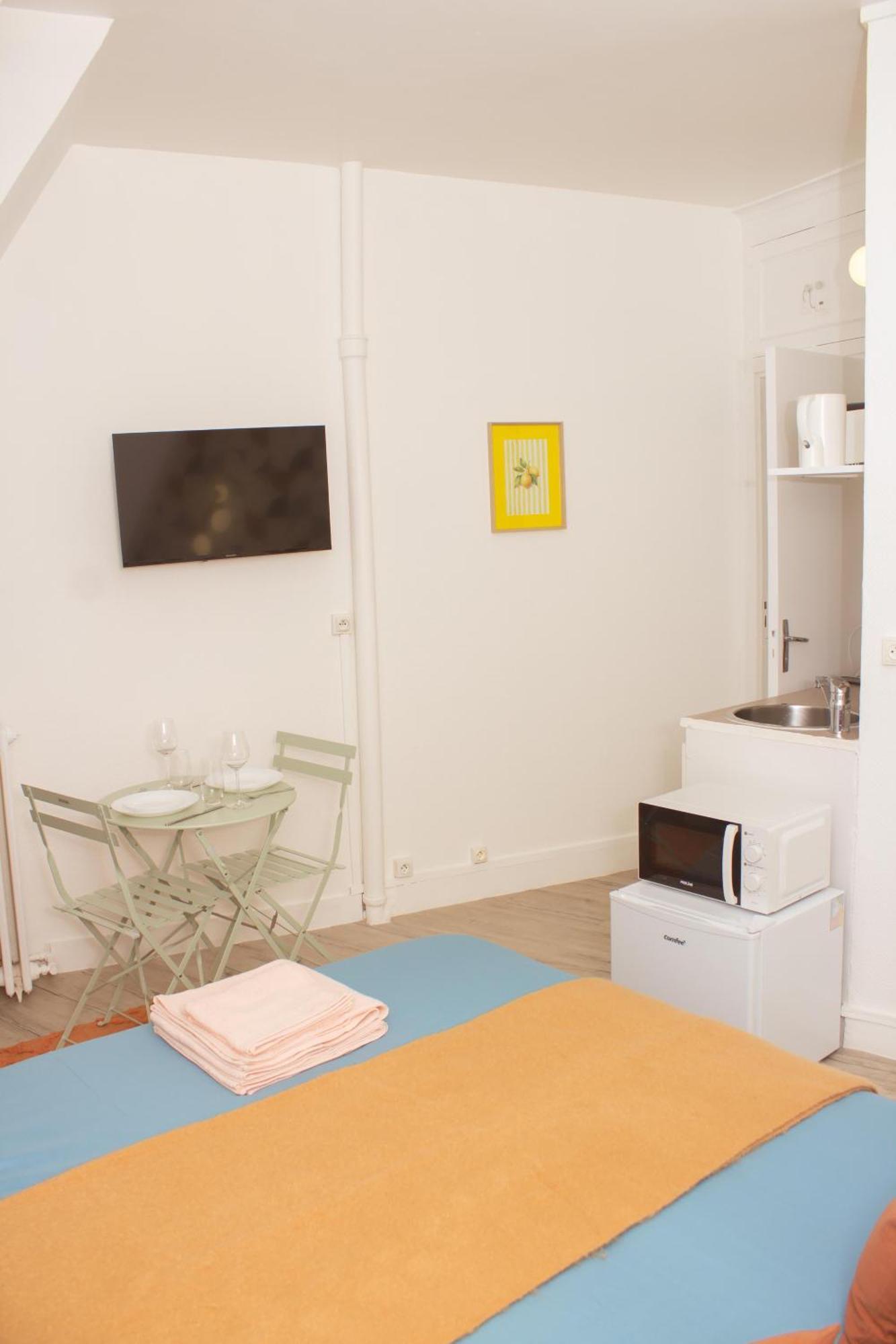 Place Equipe Au Coeur De Avec Vue Sur L'arc De Triomphe Et La Tour Eiffel Homestay *