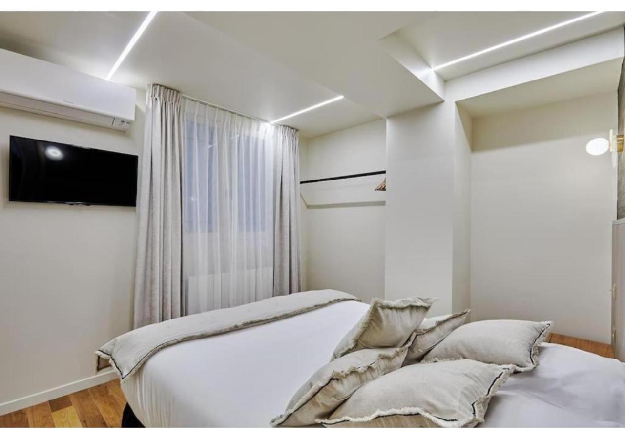 Appartement Le Marais Place Des Vosges By Prestige