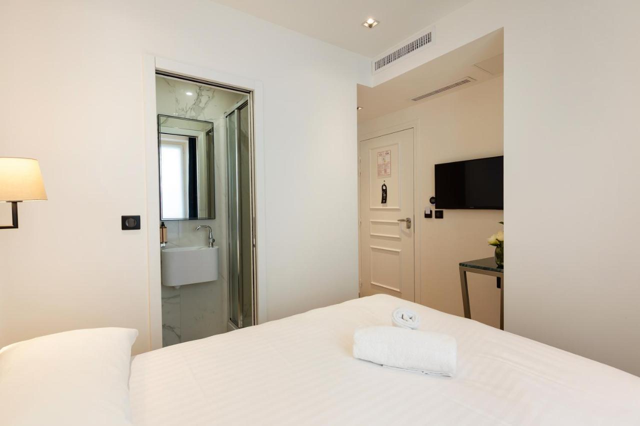 Hotel Au Coeur De Republique Paris